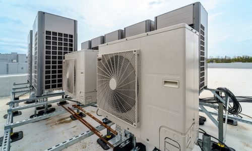 Multizone air conditioning and ventilation system. Outdoor units on the roof of a large industrial building.